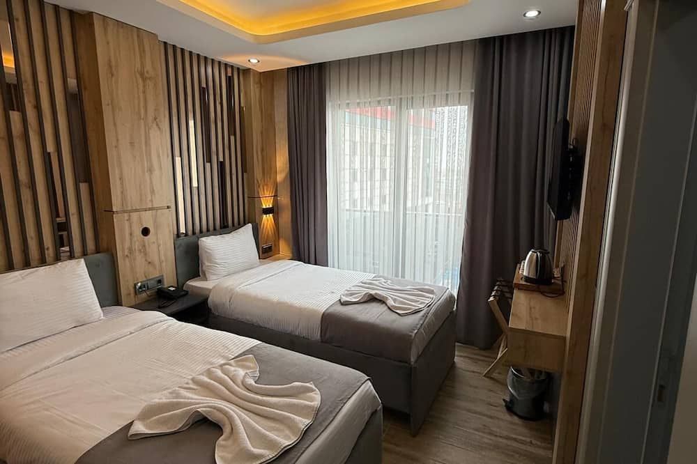 world say hotel - ואן - חדר שינה