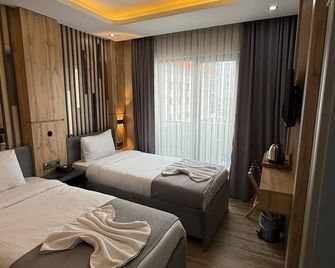 world say hotel - ואן - חדר שינה