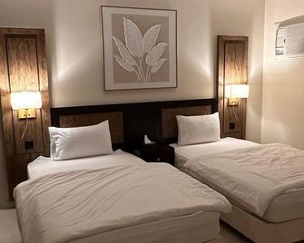 Alshowaish Apartments - Taif - Bedroom