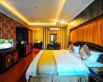 Interpark Hotel - Subic Bay Freeport Zone - Schlafzimmer
