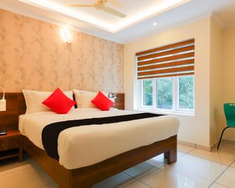 Collection O Companion Leisure Homes - Kovalam - Schlafzimmer