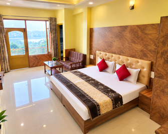 Goroomgo Hotel The Mountain Paradise Rewalsar - Mandi - Bedroom