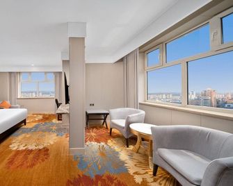Sunnydate International Hotel (Mudanjiang Railway Station Branch) - Mudanjiang - Camera da letto