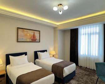 Garnet Mir Hotel - 塔什干 - 臥室
