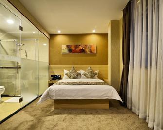 Kaiping Sanbu Junying Hotel - Jiangmen - Bedroom