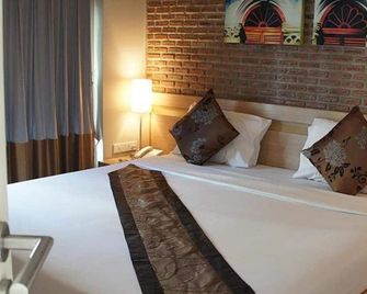 Chinotel - Phuket - Schlafzimmer
