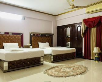 Hotel Heaven Inn - Dhaka - Bedroom