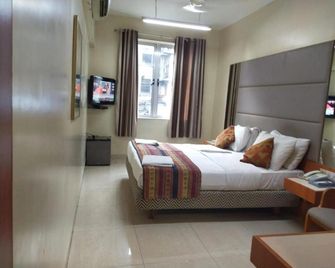 Empire Hotel - مومباي - غرفة نوم