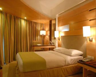 Peninsula Grand Hotel - מומבאי - חדר שינה