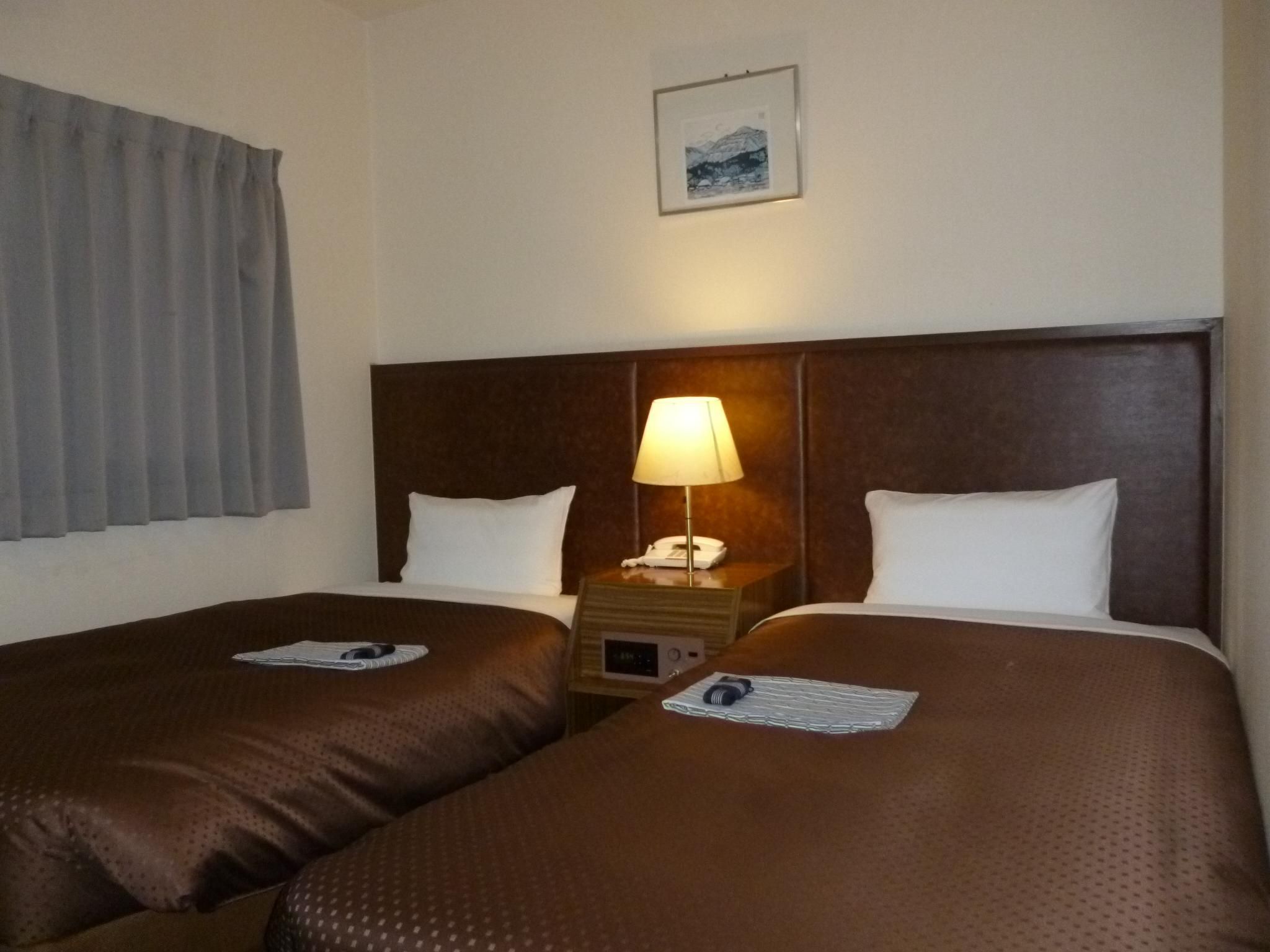 Hotel Tosaji Takasu - كوشي - غرفة نوم