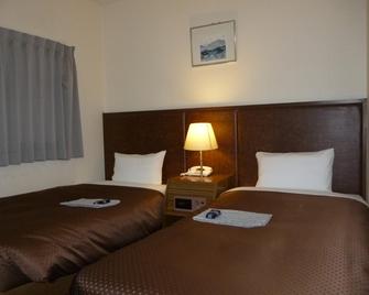 Hotel Tosaji Takasu - Kochi - Schlafzimmer
