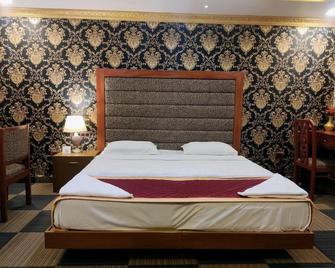 Royal Retreat - Munnar - Soveværelse