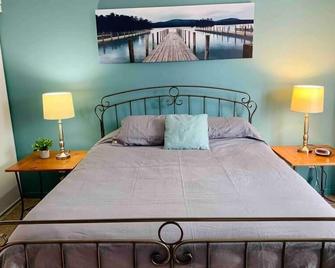 Condo Club Azur Plage Memphremagog - Magog - Bedroom
