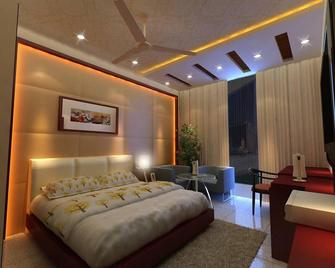 OYO Hotel Sun Park - Бхопал - Спальня