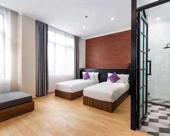 إس لوفت مانادو - مانادو - غرفة نوم