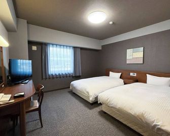 Hotel Route-Inn Omagari Ekimae - דשאן - חדר שינה