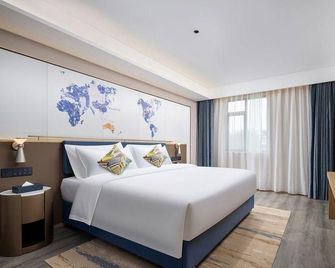 Kyriad Hotel (Zhengzhou Zijingshan Business District Wenmiao Subway Station Store) - Zhengzhou - Bedroom