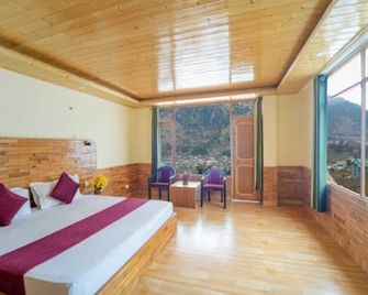 Hotel Sumeera Inn - Manali - Bedroom