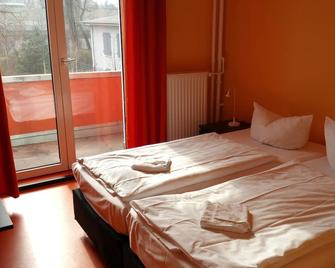 Happy Go Lucky Hotel + Hostel - Berlin - Schlafzimmer