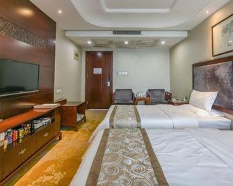 Laoying International Hotel - Shiyan - Bedroom