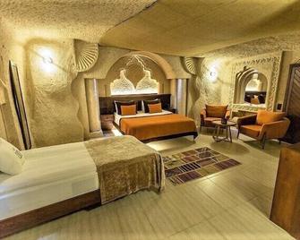 Mimi Cappadocia Luxury Cave Hotel - Uchisar - Schlafzimmer