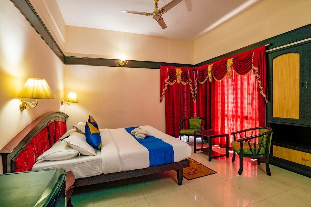 Munnar Inn - מונאר - חדר שינה