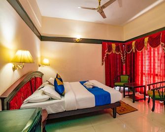 Munnar Inn - Munnar - Bedroom