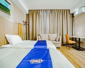 Super 8 by Wyndham Hetian Tuan Jie Square - Ciudad de Jotán - Habitación