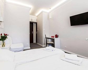 Hotel Tajty - Giżycko - Schlafzimmer