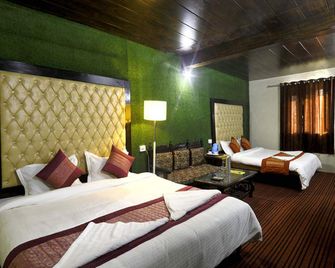 Hotel Kausani Retreat - Kausani - Ložnice