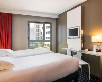 Residence Otelia Affaires & Bien-etre - Lyon - Makuuhuone