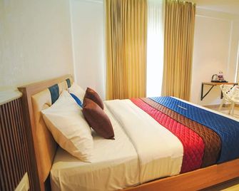 Grace Residency - Sultan Bathery - Slaapkamer