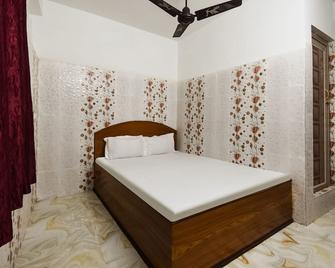 Spot On 49451 New Bishnupriya Hotel - Krishnanagar - Bedroom