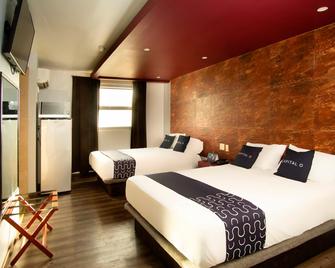 Capital O Hotel Rose - Ensenada - Schlafzimmer