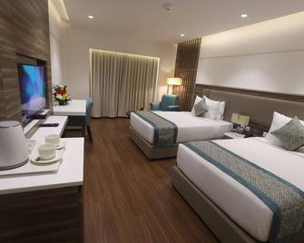 Pharos Hotels - Chennai - Bedroom