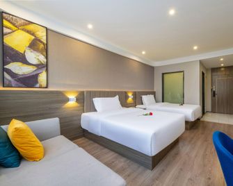 7 Days Premium Hotel (Zhuhai Gongbei Port) - Zhuhai - Bedroom