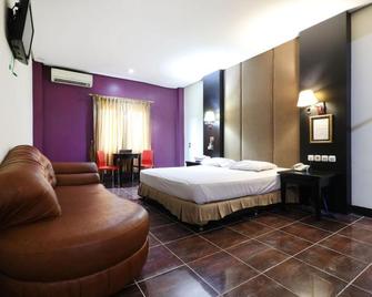 C'One Pulomas Hotel - Yakarta - Habitación