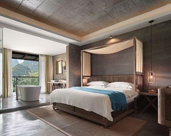 Qixin Jiuyin Inn Yangshuo - Guilin - Bedroom