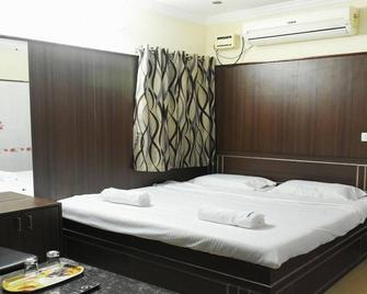 Hotel Govind Heights - Tirupati - Ložnice