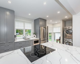 Hockley Riverside Cottage • Loft and Bunkie - Mono - Kitchen