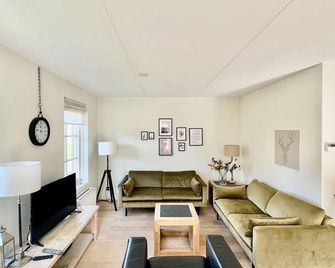 Attractive, Detached Holiday Home in Small-scale Holiday Park - Schoorl - Sala de estar