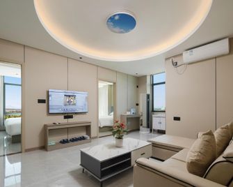 Boyuanying Hotel (Boao High-speed Railway Station Branch) - Qionghai - Bedroom