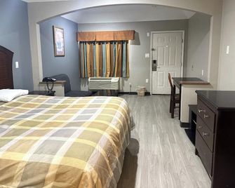 Hotel O Regency Suites Houston - Iah Beltway 8 - Houston - Habitación