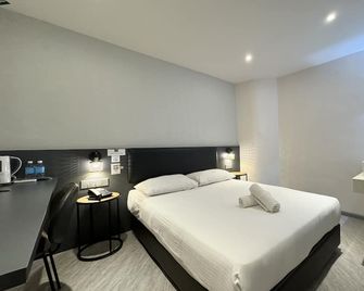 Woco Boutique Hotel Kinrara - Puchong - Schlafzimmer
