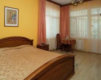 Lira Hotel - Saratov - Slaapkamer