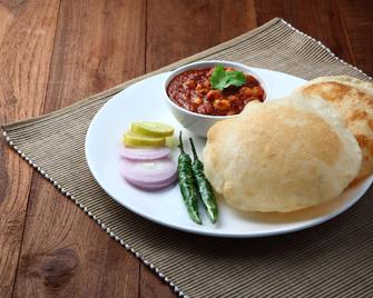 Capital O Hotel Rourkela Palace - Raurkela - Restaurant