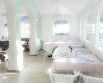 Hotel Garni Hubertus-Nostalgie & Charme - פולפמס - מסעדה