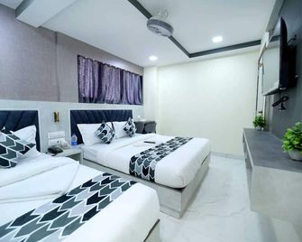 N.M. Hotel - מומבאי - חדר שינה