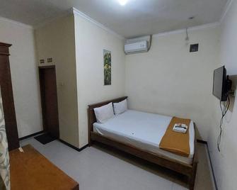 Kaja Guest House by Pesen Kamar - Malang - Bedroom