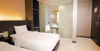 The Crew Hotel Kualanamu International Airport - Medan - Bedroom